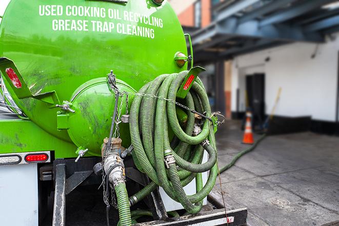 pump truck removing waste from a grease trap in Dunn Loring